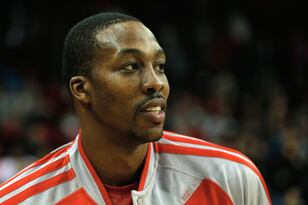 Hi-res-452302313-dwight-howard-of-the-houston-rockets-waits-on-the-court_crop_north
