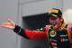 NOIDA, INDIA - OCTOBER 27: Romain Grosjean of France and Lotus celebrates finishing third during the Indian Formula One Grand Prix at Buddh International Circuit on October 27, 2013 in Noida, India. (Photo by Clive Mason/Getty Images)