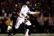 COLUMBIA, MO - NOVEMBER 30: Quarterback Johnny Manziel #2 of the Texas A&M Aggies scrambles as defensive lineman Harold Brantley #90 of the Missouri Tigers chases during the game on November 30, 2013 in Columbia, Missouri. (Photo by Jamie Squire/Getty Images)