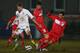 TELFORD, ENGLAND - MARCH 21: Nick Powell (L) of England is challenged by Hakan Calhanoglu (R) of Turkey during the England U19's versus Turkey U19's International match at New Bucks Head Stadium on March 21, 2013 in Telford, England. (Photo by Michael Steele/Getty Images)