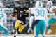 PITTSBURGH, PA - DECEMBER 08: Ben Roethlisberger #7 of the Pittsburgh Steelers heads up field against the Miami Dolphins at Heinz Field on December 8, 2013 in Pittsburgh, Pennsylvania. Miami won the game 34-28. (Photo by Gregory Shamus/Getty Images)