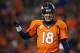 DENVER, CO - DECEMBER 8: Quarterback Peyton Manning #18 of the Denver Broncos celebrates a 20 yard fourth quarter touchdown pass to Eric Decker #87 (not pictured) during a game against the Tennessee Titans at Sports Authority Field Field at Mile High on December 8, 2013 in Denver, Colorado. (Photo by Dustin Bradford/Getty Images)