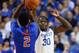 LEXINGTON, KY - DECEMBER 10: Julius Randle #30 of the Kentucky Wildcats defends the shot of Derrick Marks #2 of the Boise State Broncos during the game at Rupp Arena on December 10, 2013 in Lexington, Kentucky. (Photo by Andy Lyons/Getty Images)