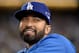 LOS ANGELES, CA - OCTOBER 07: Matt Kemp of the Los Angeles Dodgers smiles from the dugout as the Dodgers take on the Atlanta Braves in Game Four of the National League Division Series at Dodger Stadium on October 7, 2013 in Los Angeles, California. Kemp is on the disabled list due to an ankle injury. (Photo by Harry How/Getty Images)