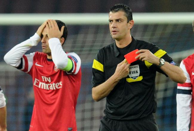 Hi-res-455183343-referee-viktor-kassai-shows-the-red-card-to-mikel_crop_north
