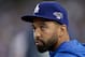 LOS ANGELES, CA - OCTOBER 14: Matt Kemp of the Los Angeles Dodgers looks on while taking on the St. Louis Cardinals in Game Three of the National League Championship Series at Dodger Stadium on October 14, 2013 in Los Angeles, California. (Photo by Jeff Gross/Getty Images)
