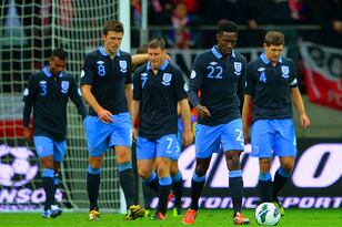 Hi-res-154275803-england-players-look-dejected-after-poland-score-to_crop_north