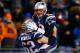 FOXBORO, MA - DECEMBER 08: Tom Brady #12 celebrates with teammate Ryan Wendell #62 of the New England Patriots following a touchdown late in the fourth quarter against the Cleveland Browns during the game at Gillette Stadium on December 8, 2013 in Foxboro, Massachusetts. (Photo by Jared Wickerham/Getty Images)