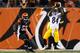 CINCINNATI, OH - SEPTEMBER 16: Antonio Brown #84 of the Pittsburgh Steelers catches a pass in front of Vontaze Burfict #55 of the Cincinnati Bengals during the fourth quarter on September 16, 2013 at Paul Brown Stadium on September 16, 2013 in Cincinnati, Ohio. Cincinnati defeated Pittsburgh 20-10. (Photo by Kirk Irwin/Getty Images)