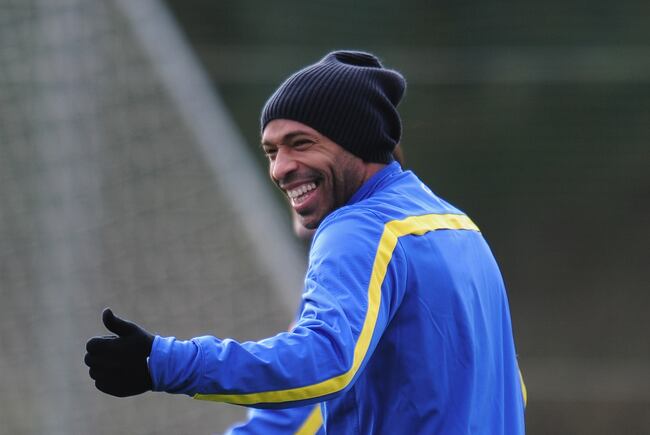 Hi-res-451899759-former-arsenal-player-thierry-henry-warms-up-during-a_crop_north