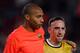 BARCELONA, SPAIN - APRIL 08: Thierry Henry (L) of Barcelona walks off the pitch with his fellow countryman Franck Ribery of Bayern Munich prior to the UEFA Champions League quarter final first leg match between FC Barcelona and FC Bayern Munich at the Camp Nou stadium on April 8, 2009 in Barcelona, Spain. Barcelona won the match 4-0. (Photo by Jasper Juinen/Getty Images)