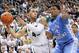 Dec 4, 2013; East Lansing, MI, USA; Michigan State Spartans guard Denzel Valentine (45) looks to pass the ball against North Carolina Tar Heels forward Kennedy Meeks (3) during the 2nd half a game at Jack Breslin Student Events Center. Mandatory Credit: Mike Carter-USA TODAY Sports