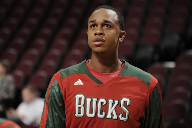 John Henson Sends Emphatic Message to NCAA with 'Scam' T-Shirt