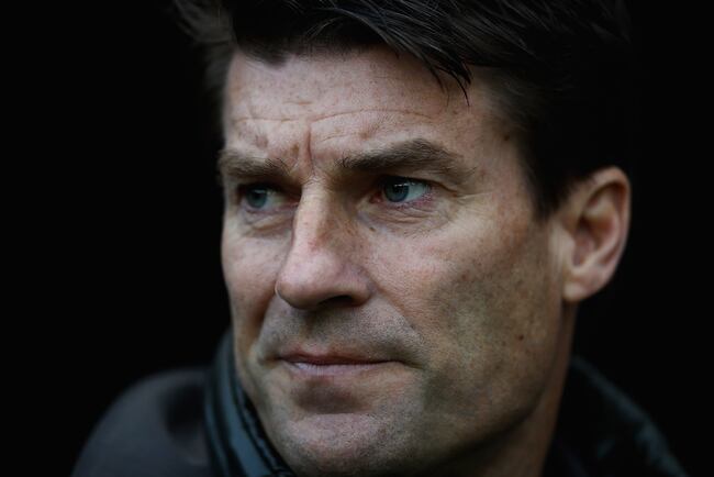 Hi-res-156580273-michael-laudrup-manager-of-swansea-city-looks-on-during_crop_north