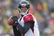 Dec 8, 2013; Green Bay, WI, USA; Atlanta Falcons quarterback Matt Ryan (2) looks to throw a pass during the second quarter against the Green Bay Packers at Lambeau Field. Mandatory Credit: Jeff Hanisch-USA TODAY Sports