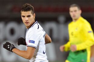 Hi-res-184047292-erik-lamela-of-tottenham-hotspur-fc-in-action-during_crop_north