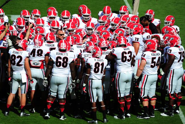 Hi-res-183167162-head-coach-mark-richt-of-the-georgia-bulldogs-huddles_crop_north