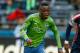 SEATTLE, WA - APRIL 13: Steve Zakuani #11 of the Seattle Sounders FC dribbles against the New England Revolution at CenturyLink Field on April 13, 2013 in Seattle, Washington. (Photo by Otto Greule Jr/Getty Images)