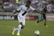 Jun 29, 2013; Palo Alto, CA, USA; Los Angeles Galaxy defender Sean Franklin (5) kicks the ball against the San Jose Earthquakes during the first half at Stanford Stadium. Mandatory Credit: Kelley L Cox-USA TODAY Sports
