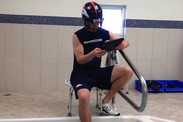 Broncos Explain Why Peyton Manning Watched Film While Wearing Helmet in Tub