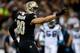 NEW ORLEANS, LA - DECEMBER 08: Jimmy Graham #80 of the New Orleans Saints reacts after catching a pass against the Carolina Panthers at Mercedes-Benz Superdome on December 8, 2013 in New Orleans, Louisiana. (Photo by Chris Graythen/Getty Images)