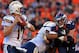 DENVER, CO - NOVEMBER 18: Defensive end Derek Wolfe #95 of the Denver Broncos rushes against the block of tackle Michael Harris #79 of the San Diego Chargers in pursuit of quarterback Philip Rivers #17 of the San Diego Chargers at Sports Authority Field at Mile High on November 18, 2012 in Denver, Colorado. The Broncos defeated the Chargers 30-23. (Photo by Doug Pensinger/Getty Images)