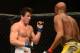 Jul. 7, 2012; Las Vegas, NV, USA; UFC fighter Chael Sonnen (left) against Anderson Silva during a middleweight bout in UFC 148 at the MGM Grand Garden Arena. Mandatory Credit: Mark J. Rebilas-USA TODAY Sports