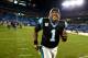 CHARLOTTE, NC - NOVEMBER 18: Cam Newton #1 of the Carolina Panthers runs off the field after defeating the New England Patriots 24-20 during their game at Bank of America Stadium on November 18, 2013 in Charlotte, North Carolina. (Photo by Streeter Lecka/Getty Images)