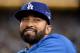 LOS ANGELES, CA - OCTOBER 07: Matt Kemp of the Los Angeles Dodgers smiles from the dugout as the Dodgers take on the Atlanta Braves in Game Four of the National League Division Series at Dodger Stadium on October 7, 2013 in Los Angeles, California. Kemp is on the disabled list due to an ankle injury. (Photo by Harry How/Getty Images)