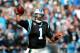 CHARLOTTE, NC - DECEMBER 01: Cam Newton #1 of the Carolina Panthers drops back to pass against the Tampa Bay Buccaneers during their game at Bank of America Stadium on December 1, 2013 in Charlotte, North Carolina. (Photo by Streeter Lecka/Getty Images)