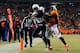 DENVER, CO - DECEMBER 12: Keenan Allen #13 of the San Diego Chargers scores a second quarter touchdown against Mike Adams #20 of the Denver Broncos at Sports Authority Field at Mile High on December 12, 2013 in Denver, Colorado. (Photo by Dustin Bradford/Getty Images)