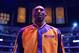 LOS ANGELES, CA - DECEMBER 10: Kobe Bryant #24 of the Los Angeles Lakers looks on during the performance of the National Anthem before facing the Phoenix Suns at Staples Center on December 10, 2013 in Los Angeles, California. NOTE TO USER: User expressly acknowledges and agrees that, by downloading and/or using this Photograph, user is consenting to the terms and conditions of the Getty Images License Agreement. Mandatory Copyright Notice: Copyright 2013 NBAE (Photo by Andrew D. Bernstein/NBAE via Getty Images)