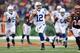 CINCINNATI, OH - DECEMBER 08: Andrew Luck #12 of the Indianapolis Colts runs with the ball during the NFL game against the Cincinnati Bengals at Paul Brown Stadium on December 8, 2013 in Cincinnati, Ohio. (Photo by Andy Lyons/Getty Images)