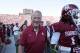 Switzer (center) is one of the greatest coaches to ever walk the sidelines at Norman.