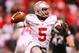 Dec 7, 2013; Indianapolis, IN, USA; Ohio State Buckeyes quarterback Braxton Miller (5) throws a pass during the third quarter of the 2013 Big 10 Championship game against the Michigan State Spartans at Lucas Oil Stadium. Mandatory Credit: Andrew Weber-USA TODAY Sports