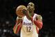 HOUSTON, TX - DECEMBER 08: Dwight Howard #12 of the Houston Rockets take a free throw during the game against the Orlando Magic at Toyota Center on December 8, 2013 in Houston, Texas. NOTE TO USER: User expressly acknowledges and agrees that, by downloading and or using this photograph, User is consenting to the terms and conditions of the Getty Images License Agreement. (Photo by Scott Halleran/Getty Images)