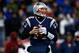 FOXBORO, MA - NOVEMBER 24: Quarterback Tom Brady #12 of the New England Patriots looks to pass against the Denver Broncos during a game at Gillette Stadium on November 24, 2013 in Foxboro, Massachusetts. (Photo by Jared Wickerham/Getty Images)