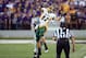 Aug 30, 2013; Manhattan, KS, USA; North Dakota State Bison wide receiver Zach Vraa (82) tries to make a catch while being hit by Kansas State Wildcats defensive back Dorrian Roberts (4) during the first half at Bill Snyder Family Stadium. Mandatory Credit: Scott Sewell-USA TODAY Sports