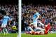MANCHESTER, ENGLAND - DECEMBER 14: Laurent Koscielny of Arsenal fails to stop Alvaro Negredo of Manchester City scoring their second goal during the Barclays Premier League match between Manchester City and Arsenal at Etihad Stadium on December 14, 2013 in Manchester, England. (Photo by Clive Brunskill/Getty Images)