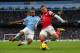 MANCHESTER, ENGLAND - DECEMBER 14: Fernandinho of Manchester City and Jack Wilshere of Arsenal battle for the ball during the Barclays Premier League match between Manchester City and Arsenal at Etihad Stadium on December 14, 2013 in Manchester, England. (Photo by Clive Brunskill/Getty Images)