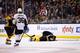 BOSTON, MA - DECEMBER 07: Brad Marchand #63 of the Boston Bruins lays on the ice in the first period after being kneed in the head by James Neal #18 of the Pittsburgh Penguins during the game at TD Garden on December 7, 2013 in Boston, Massachusetts. (Photo by Jared Wickerham/Getty Images)