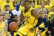 ANN ARBOR, MI - DECEMBER 14: Glenn Robinson III #1 of the Michigan Wolverines drives to the basket during the second half of the game against the Arizona Wildcats at Crisler Center on December 14, 2013 in Ann Arbor, Michigan. Arizona defeated Michigan 72-70. (Photo by Leon Halip/Getty Images)
