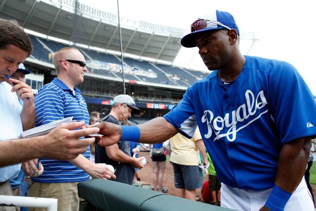 Hi-res-174115661-miguel-tejada-of-the-kansas-city-royals-signs_crop_north