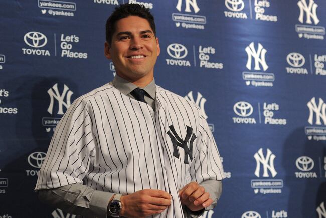 Hi-res-456052575-centerfielder-jacoby-ellsbury-puts-on-his-jersey-during_crop_north