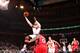 NEW YORK, NY - DECEMBER 14: Carmelo Anthony #7 of the New York Knicks shoots against Jeff Teague #0 of the Atlanta Hawks during a game at Madison Square Garden in New York City. NOTE TO USER: User expressly acknowledges and agrees that, by downloading and or using this photograph, User is consenting to the terms and conditions of the Getty Images License Agreement. Mandatory Copyright Notice: Copyright 2013 NBAE (Photo by Reid B. Kelley/NBAE via Getty Images)