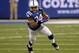 Dec 15, 2013; Indianapolis, IN, USA; Indianapolis Colts running back Trent Richardson (34) runs the ball during the first quarter against the Houston Texans at Lucas Oil Stadium. Mandatory Credit: Pat Lovell-USA TODAY Sports