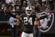 October 6, 2013; Oakland, CA, USA; Oakland Raiders free safety Charles Woodson (24) celebrates after intercepting the ball against the San Diego Chargers during the fourth quarter at O.co Coliseum. The Raiders defeated the Chargers 27-17. Mandatory Credit: Kyle Terada-USA TODAY Sports