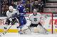 TORONTO, ON - DECEMBER 11: Martin Jones #31 of the Los Angeles Kings makes a glove save as teammate Slava Voynov #26 battles with Joffrey Lupul #19 of the Toronto Maple Leafs during NHL game action December 11, 2013 at the Air Canada Centre in Toronto, Ontario, Canada. (Photo by Graig Abel/NHLI via Getty Images)