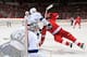 DETROIT, MI - DECEMBER 15: Ben Bishop #30 of the Tampa Bay Lightning looks over his shoulder at the play while teammate Eric Brewer #2 takes down Todd Bertuzzi #44 of the Detroit Red Wings in front of the net during an NHL game at Joe Louis Arena on December 15, 2013 in Detroit, Michigan. Tampa Bay defeated Detroit 3-0 (Photo by Dave Reginek/NHLI via Getty Images)