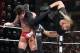 Seth Rollins hits CM Punk with an Enzuigiri.